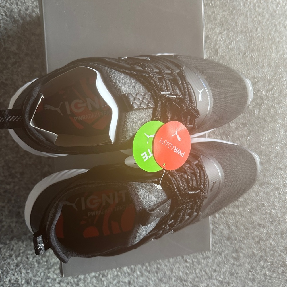 Puma Black and White Sneakers